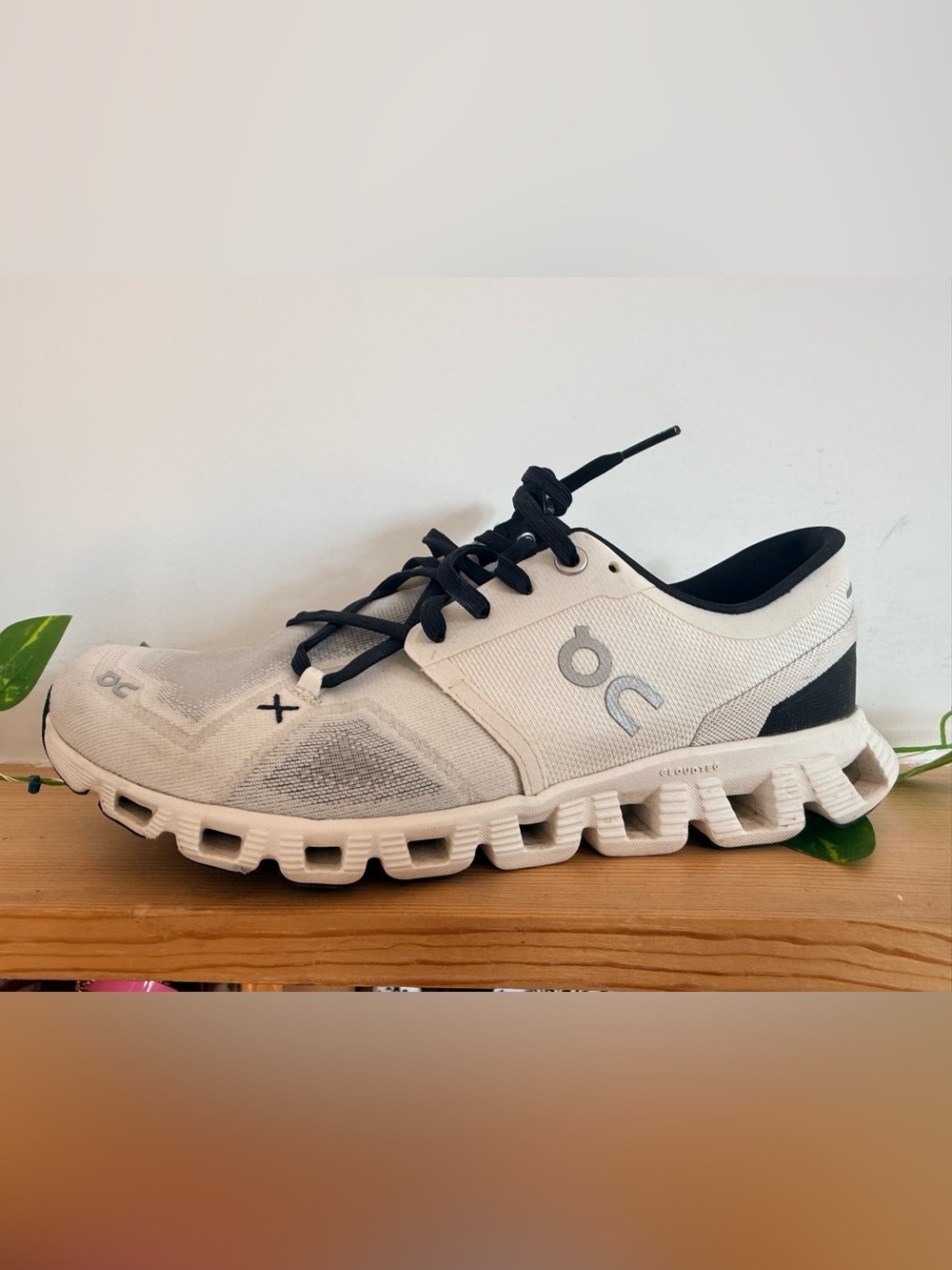 On Running White and Black Cloud-style Sneakers